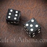 Pair of carved Horn Dice with inlaid pips